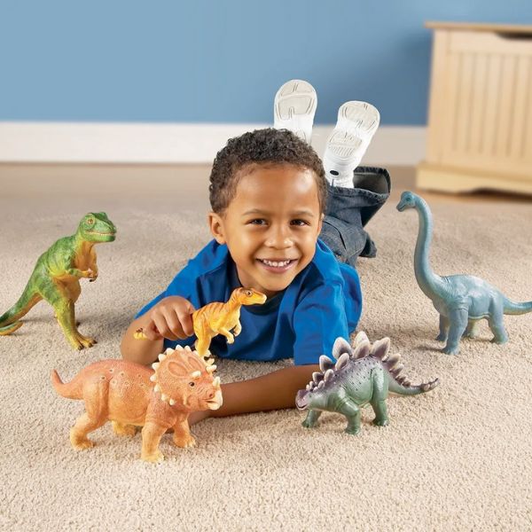 Boy-with-5-jumbo-dinosaur-toys