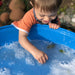 Child playing with Cirular Heavy Duty Water & Sand Play Tray