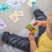 A child playing with Bigjigs Snap Card Games - Discovery Playtime 